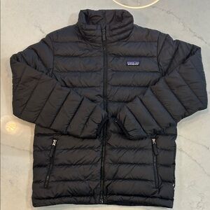 Boys size large black Patagonia sweater jacket.
